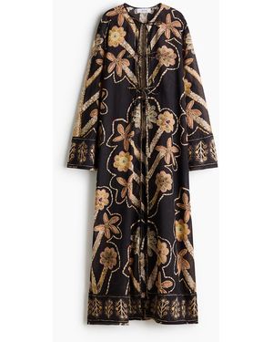 H&M Kaftankleid mit floralem Print und Bindebändern - Schwarz