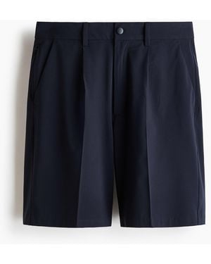 H&M Four-way Stretch Loose Fit Shorts - Blauw