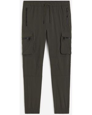 H&M Cargojoggers aus Nylon Skinny Fit - Grau