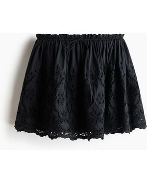 H&M Jupe mit Broderie Anglaise und Kordelzug - Schwarz