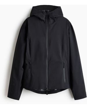 H&M Regenjacke mit StormMove in Oversized Fit - Schwarz