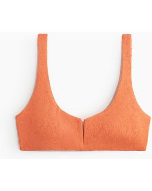 H&M Wattiertes Bikinitop - Orange