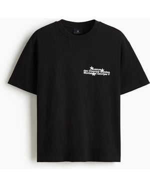 H&M Bedrucktes T-Shirt in Loose Fit - Schwarz