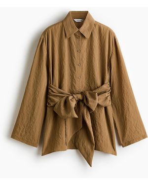 H&M Crêpe-Bluse mit Bindedetail - Natur
