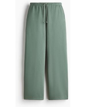H&M Weite Joggpants - Grün
