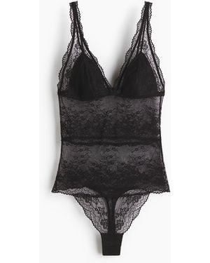 H&M Tangabody aus Spitze mit wattierten Cups - Schwarz