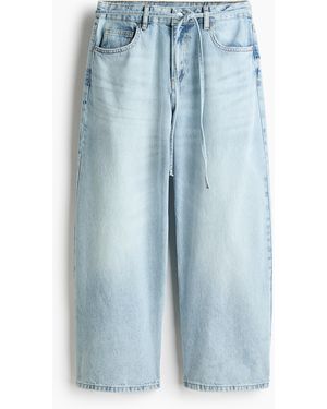 H&M Wide Regular Waist Ankle Jeans - Blau