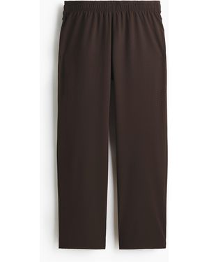 H&M Trainingshose mit DryMove in Regular Fit - Braun