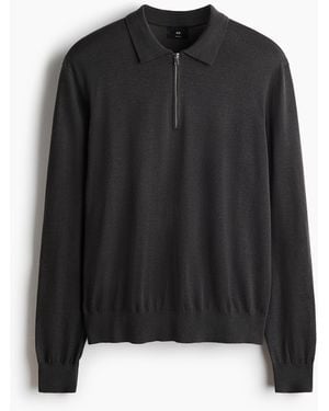 H&M Poloshirt aus Merinowolle in Regular Fit - Schwarz