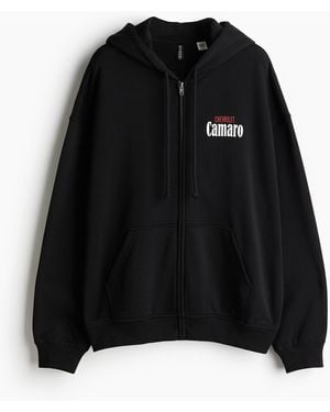 H&M Oversized Hoodiejacke mit Print - Schwarz