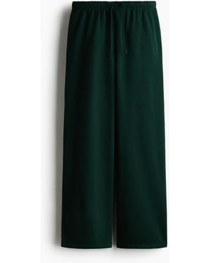 H&M Weite Joggpants - Grün