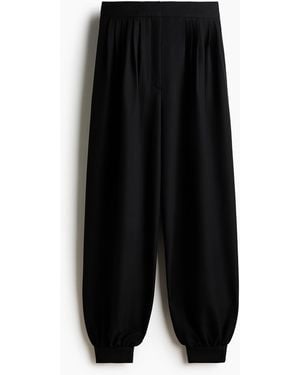 H&M Plissierte Hose mit Balloon Leg - Schwarz