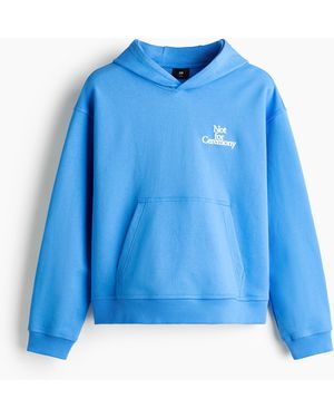 H&M Hoodie mit Motivdetails in Loose Fit - Blau