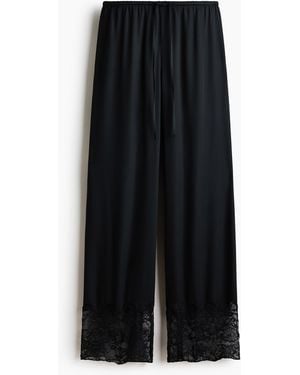 H&M Pyjamahose aus Satin mit Spitze - Schwarz