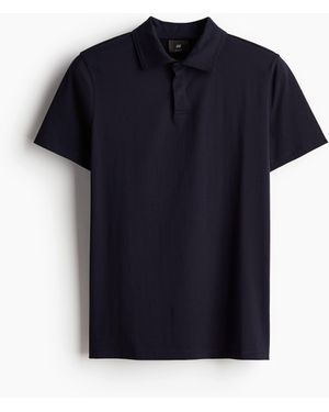 H&M Poloshirt in Muscle Fit - Blau