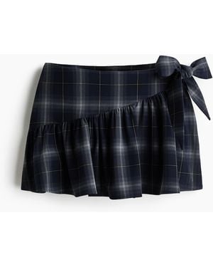 H&M Mini-Skort im Wickelschnitt - Schwarz
