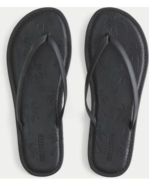 Hollister Palm Tree Pattern Flip Flops - Black