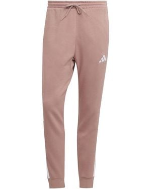 adidas Essentials Fleece Tapered Cuff 3-Stripes Joggers - Pink