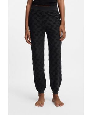 HUGO Cotton-Blend Tracksuit Bottoms With All-Over Logo Pattern - Black