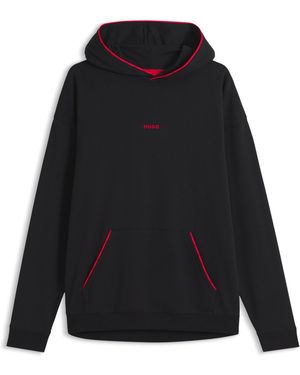 HUGO Relaxed-Fit Hoodie Met Contrasterende Logobiezen - Zwart