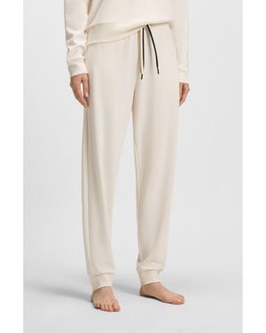 BOSS Cuffed Tracksuit Bottoms With Signature-Stripe Drawcord - White