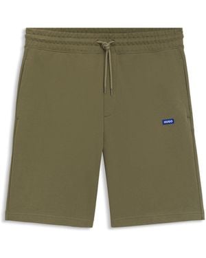 HUGO Shorts Aus Baumwoll-Terry Mit Tunnelzug Und Blauem Logo-Label - Grün