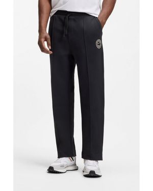 BOSS Cotton-Blend Tracksuit Bottoms With Tennis-Themed Logo - Blue