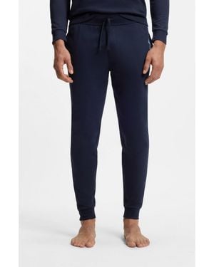 BOSS Cotton-Terry Tracksuit Bottoms With Logo And Stripe - Blue
