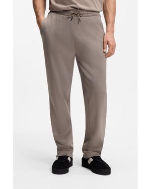 HUGO Relaxed-Fit Tracksuit Bottoms With Logo Tape - Grey