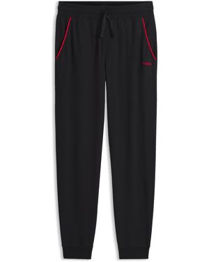 HUGO Pantalones De Chándal De Algodón Con Puños Elásticos Y Ribetes Con Logo - Negro