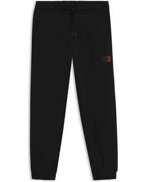 HUGO Cotton-Terry Tracksuit Bottoms With Gradient Logo - Black