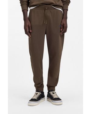 HUGO Cotton-Terry Tracksuit Bottoms With Logo Patch - Brown
