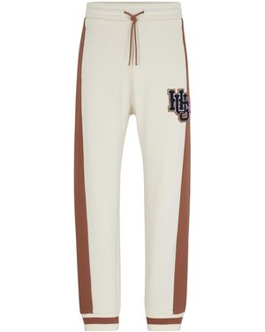 HUGO Jogginghose Aus Baumwoll-Terry Mit Logo Im College-Stil - Weiß