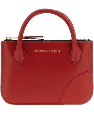 Comme des Garçons Handles - Red