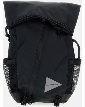 Black and wander Backpacks for Men | Lyst