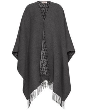 Valentino Garavani Asymmetrical Wool Poncho With Fringed Edge, Rings - Black