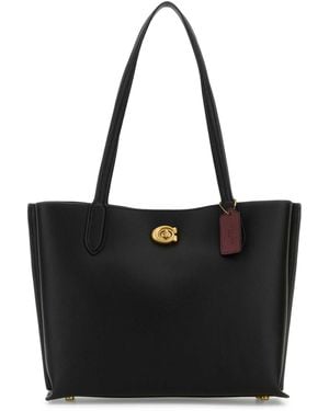 COACH Handbags - Black