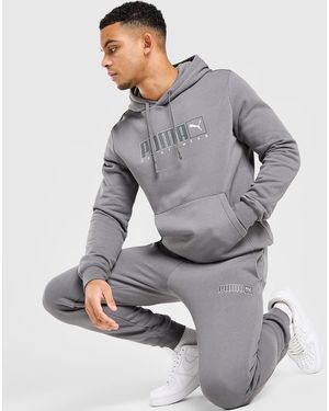 PUMA Mens Pantaloni della tuta Core Sportswear - Grigio