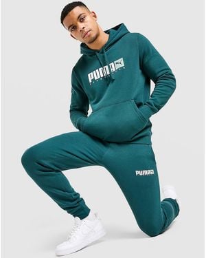 PUMA Mens Pantaloni della tuta Core Sportswear - Verde