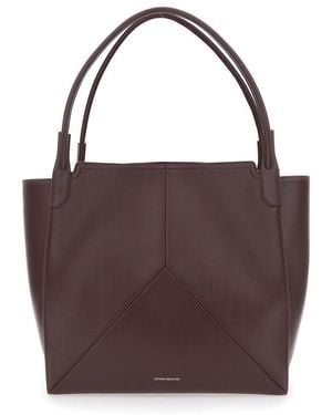 Victoria Beckham Victoria Bordeaux Handbag With V Stitching On The Front And Embossed Logo Lettering On The Front - Brown