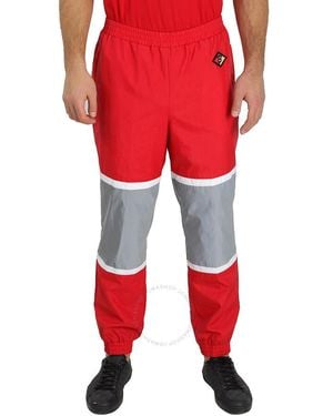 Burberry Striped Nylon Logo Graphic Trackpants - Red
