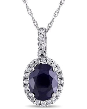 Amour Oval Diffused Sapphire And 1/4 Ct Tw Diamond Halo Pendant With Chain - Blue