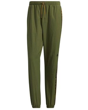 adidas M Wrd Wov Pnt Contrasting Colours Woven Loose Bundle Feet Sports Trousers - Green