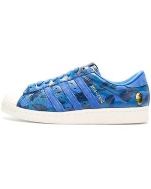 Adidas blue camo shoes hotsell