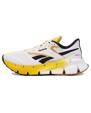 Reebok Boty Floatzig 100206593 - Yellow