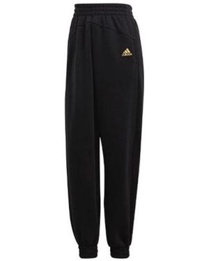 adidas (Wmns) Warm Golden Logo Trousers - Black
