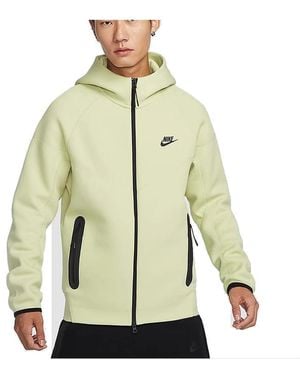 grey and yellow tech fleece