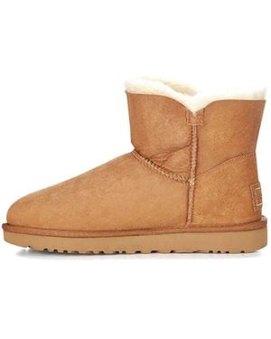UGG (Wmns) Mini Bailey Button Bling - Brown