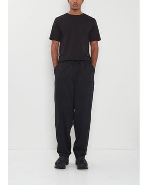 Comoli Men Wool Knit Tapered Trousers - Blue