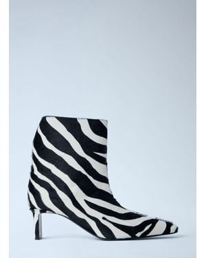 KHAITE Animal Print Pointed Toe Boots - White